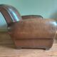 Club armchair, patinated leather