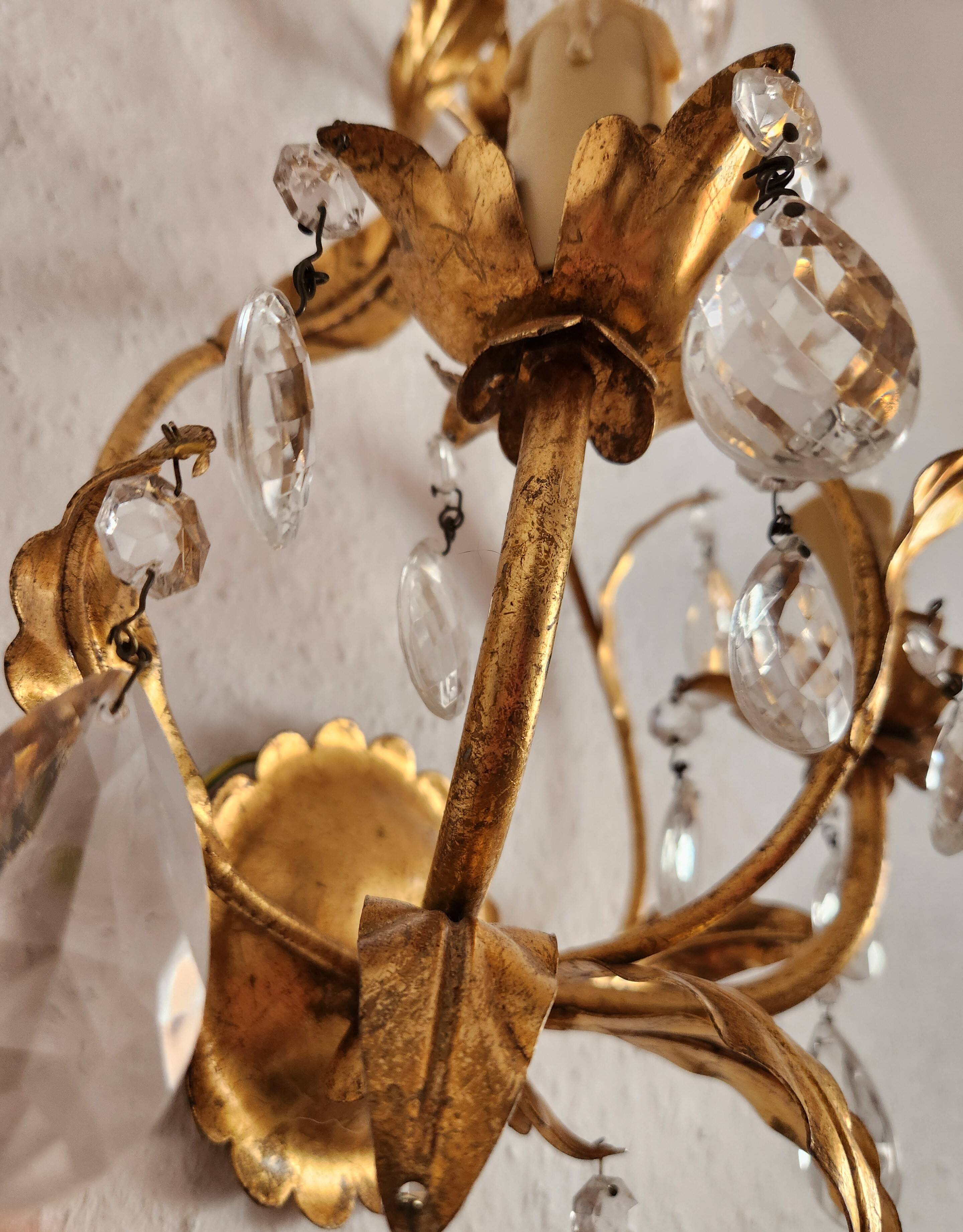 Hand-forged wall lamp gilded with gold leaf and crystals, Italy