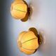 Pair of "Cocoon" wall lights in resin and pine, Italy, circa 1970