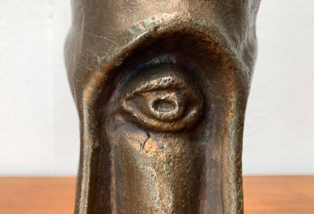 Abstract vase with a brutalist bronze face from the mid-century.