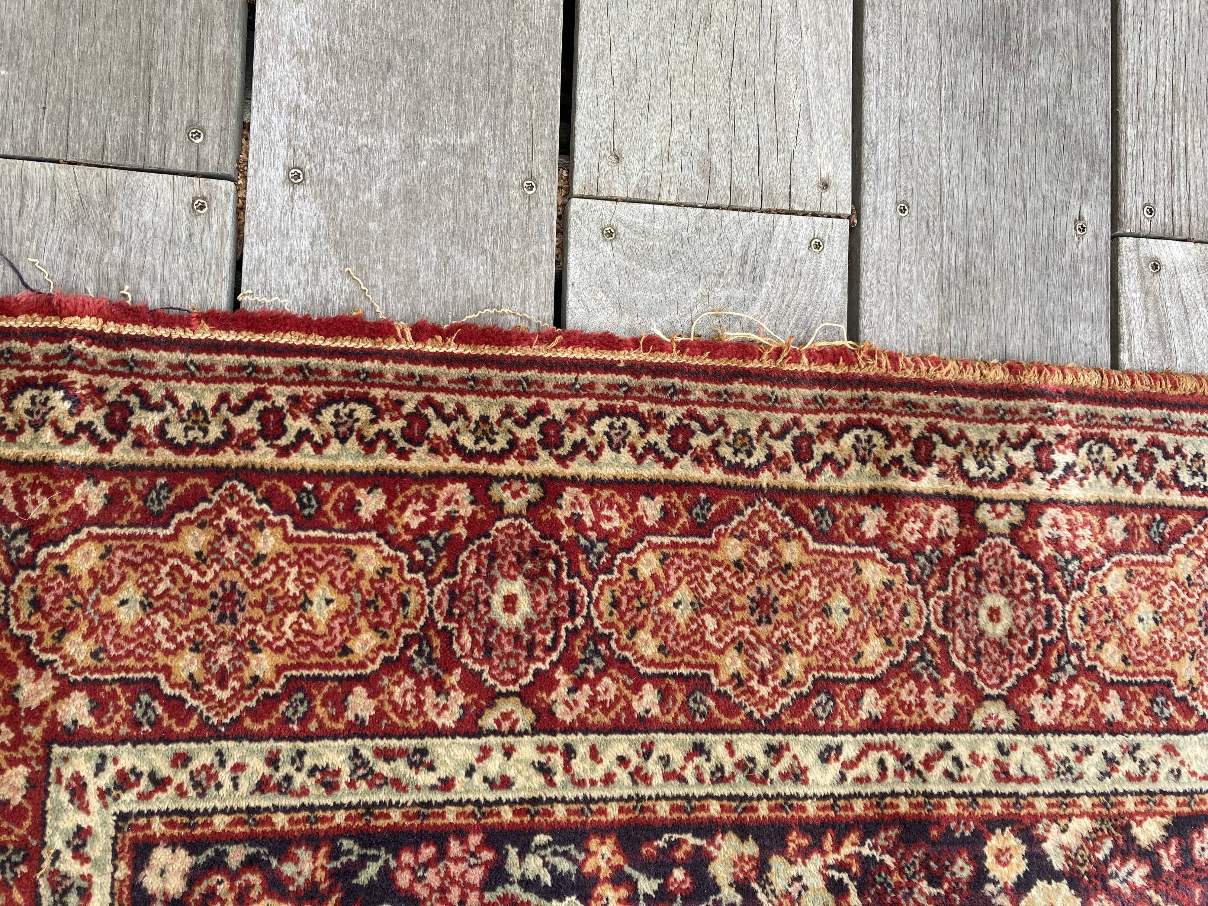Oriental carpet in wool  139x193cm