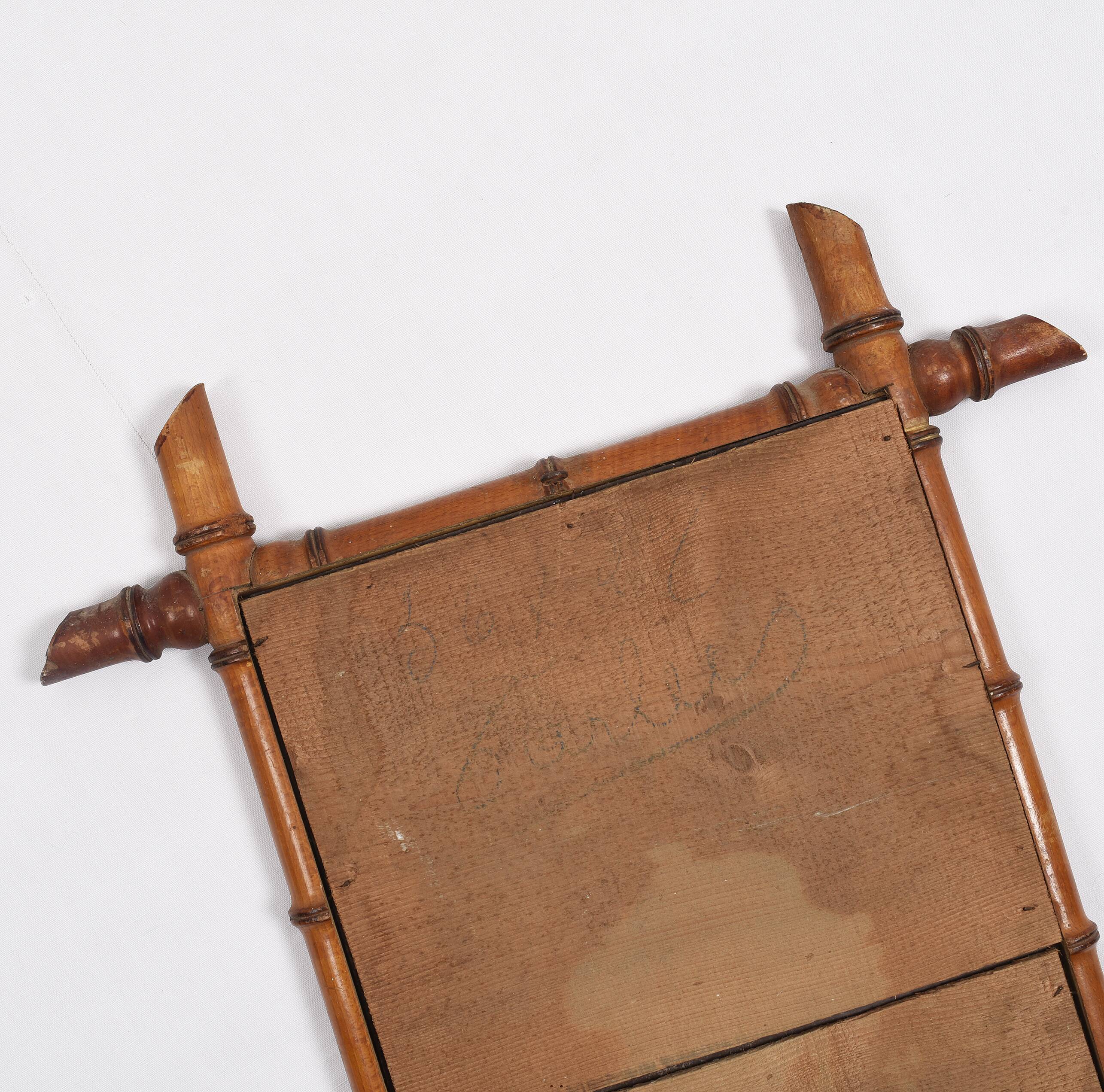 Old turned wooden mirror, bamboo imitation