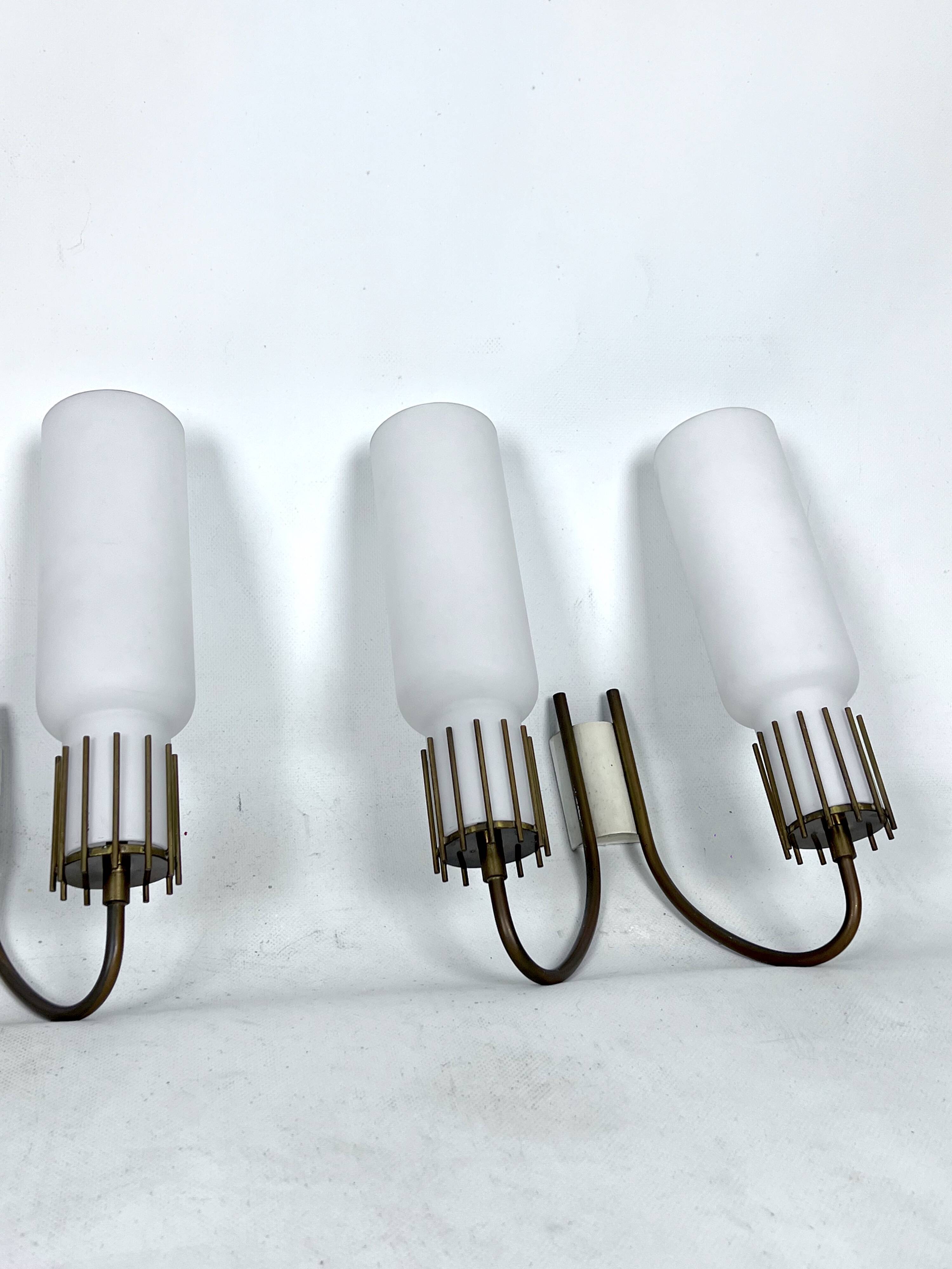 Mid-Century Modern set of three sconces in Arredoluce style. Italy 1950s