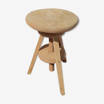 Vintage wooden stool with screws