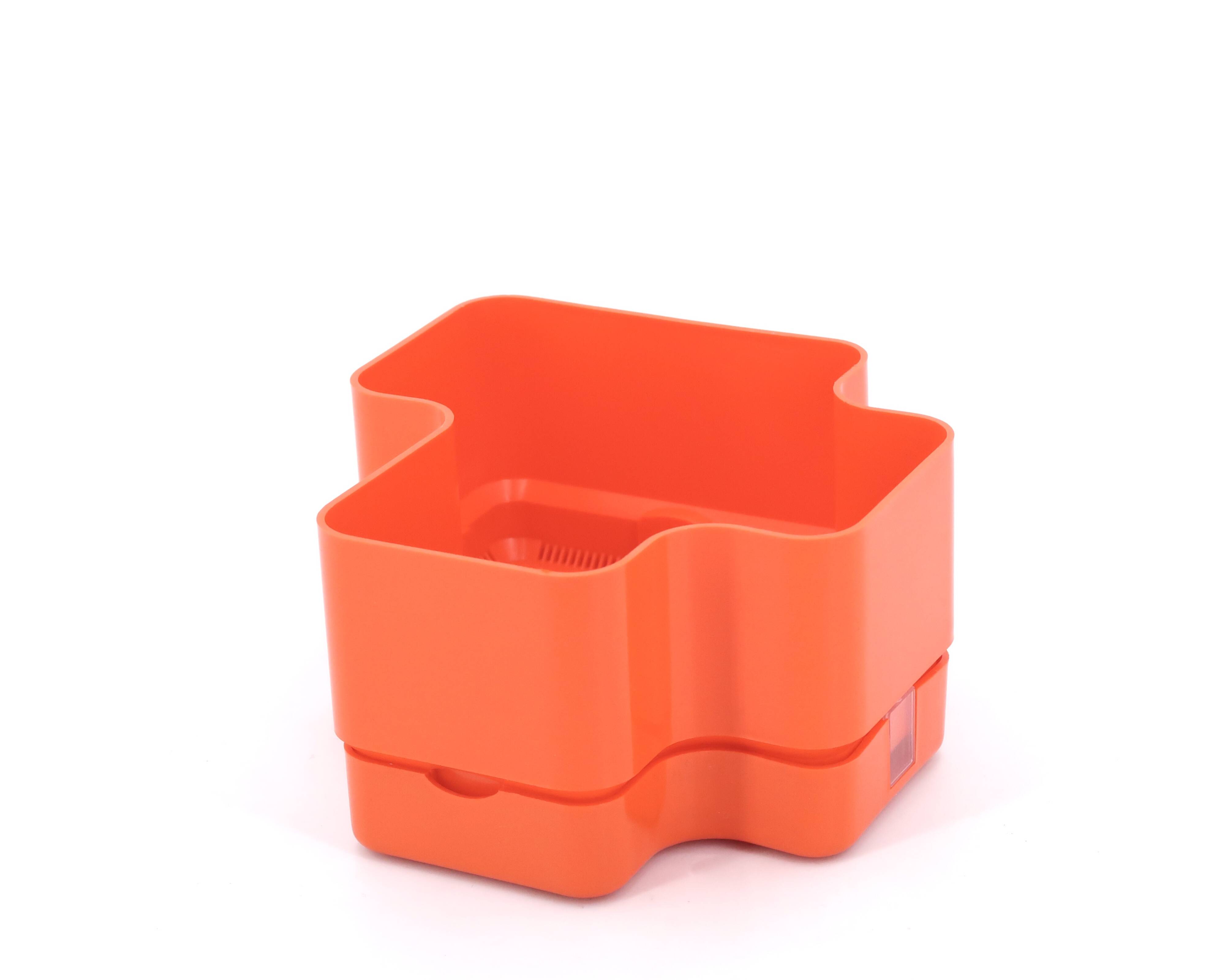 Vastill planter in orange plastic by Michael McCann