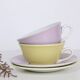 Duo of yellow and purple cups + vintage saucers