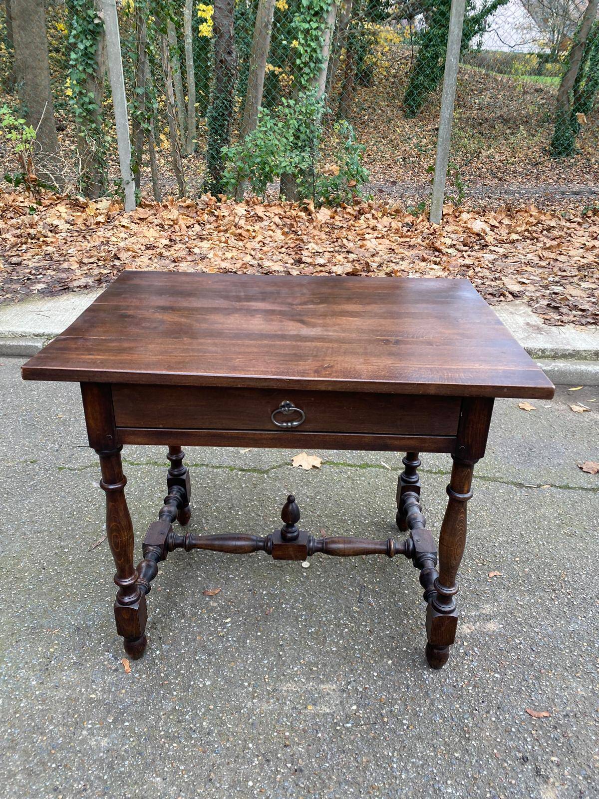 Louis XIV style writing desk in dark solid wood from the 19th century