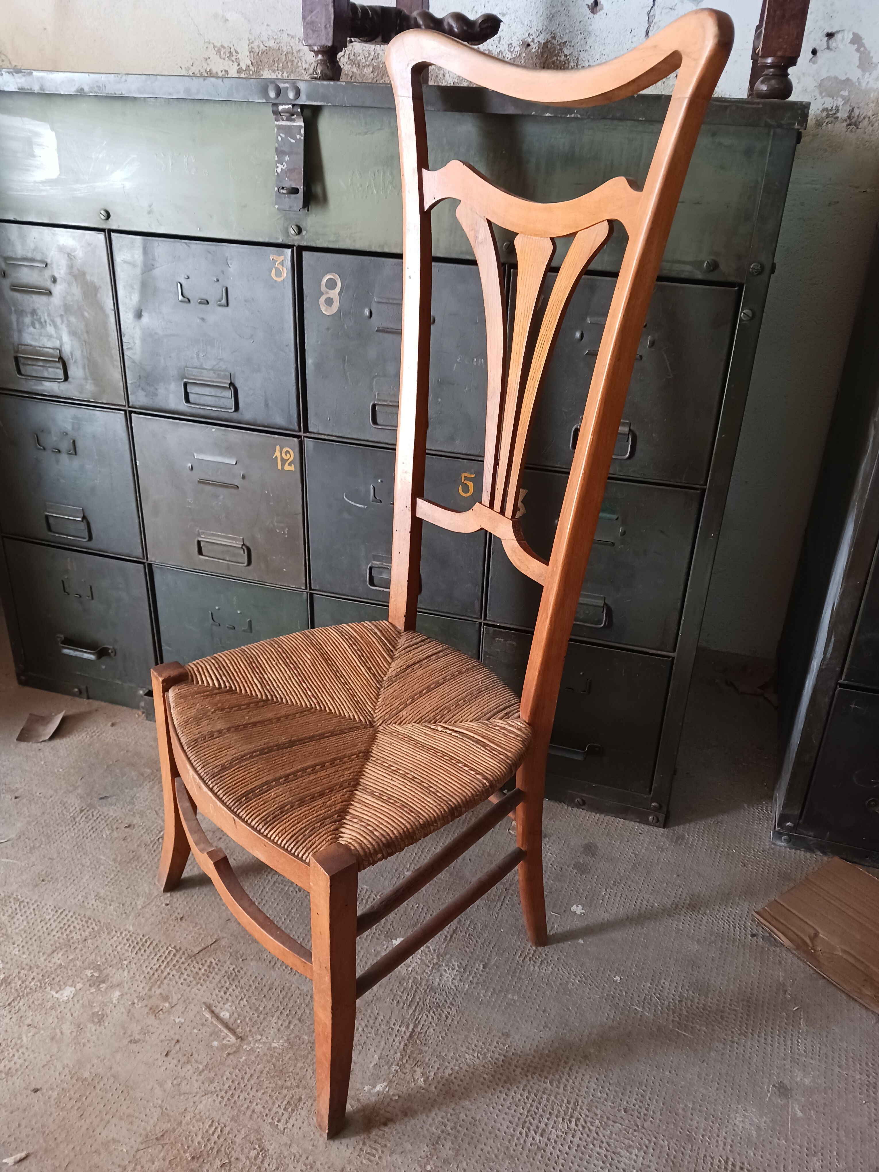 Low chair with high back, called nourishment period 1900, Art Nouveau