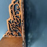 Old wall corner shelf in cut wood from the 1900s