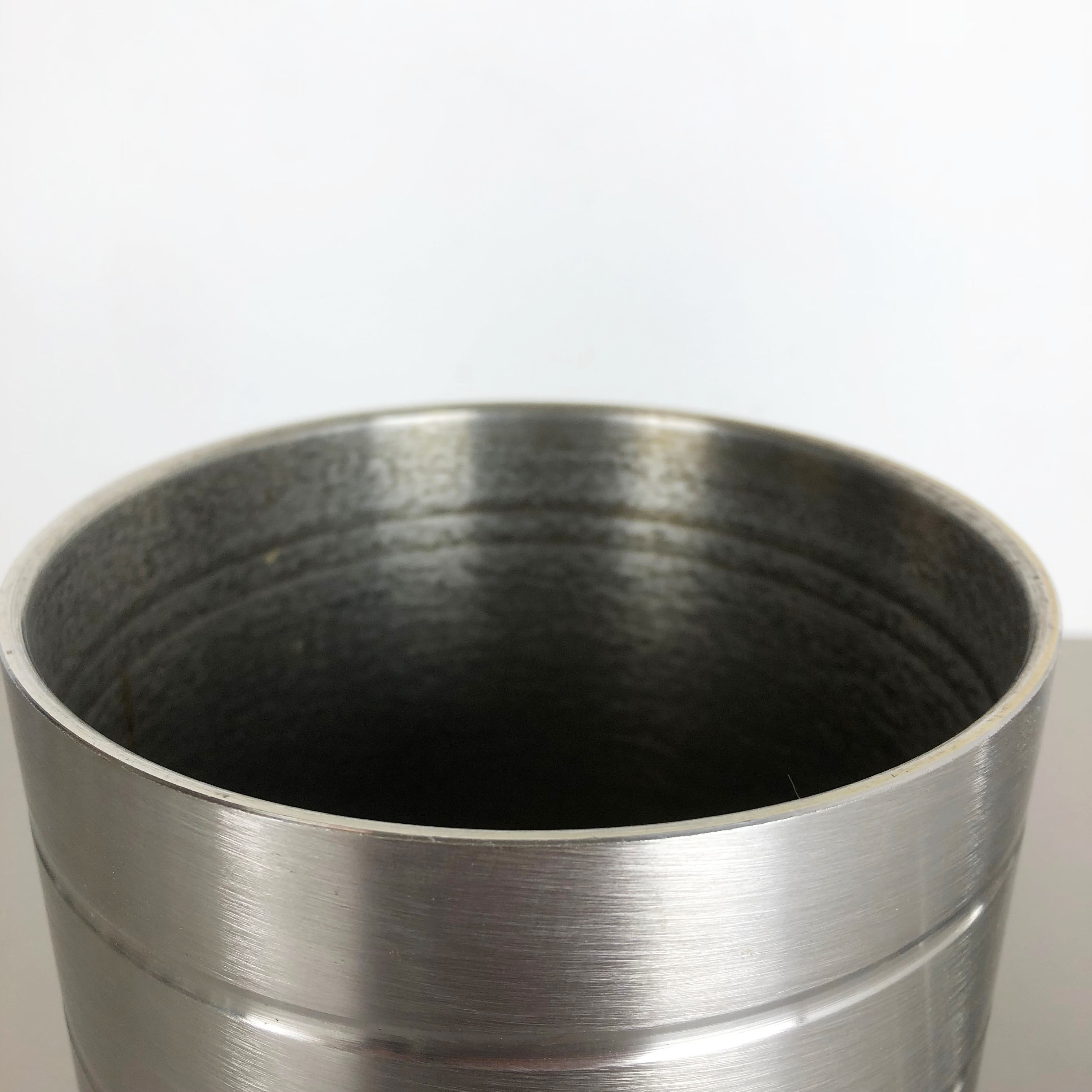 Set of 2 modernist vintage sculptural brutalist steel vases, Germany 1970s