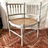 19th-century corner fireplace armchair, wood and cane.