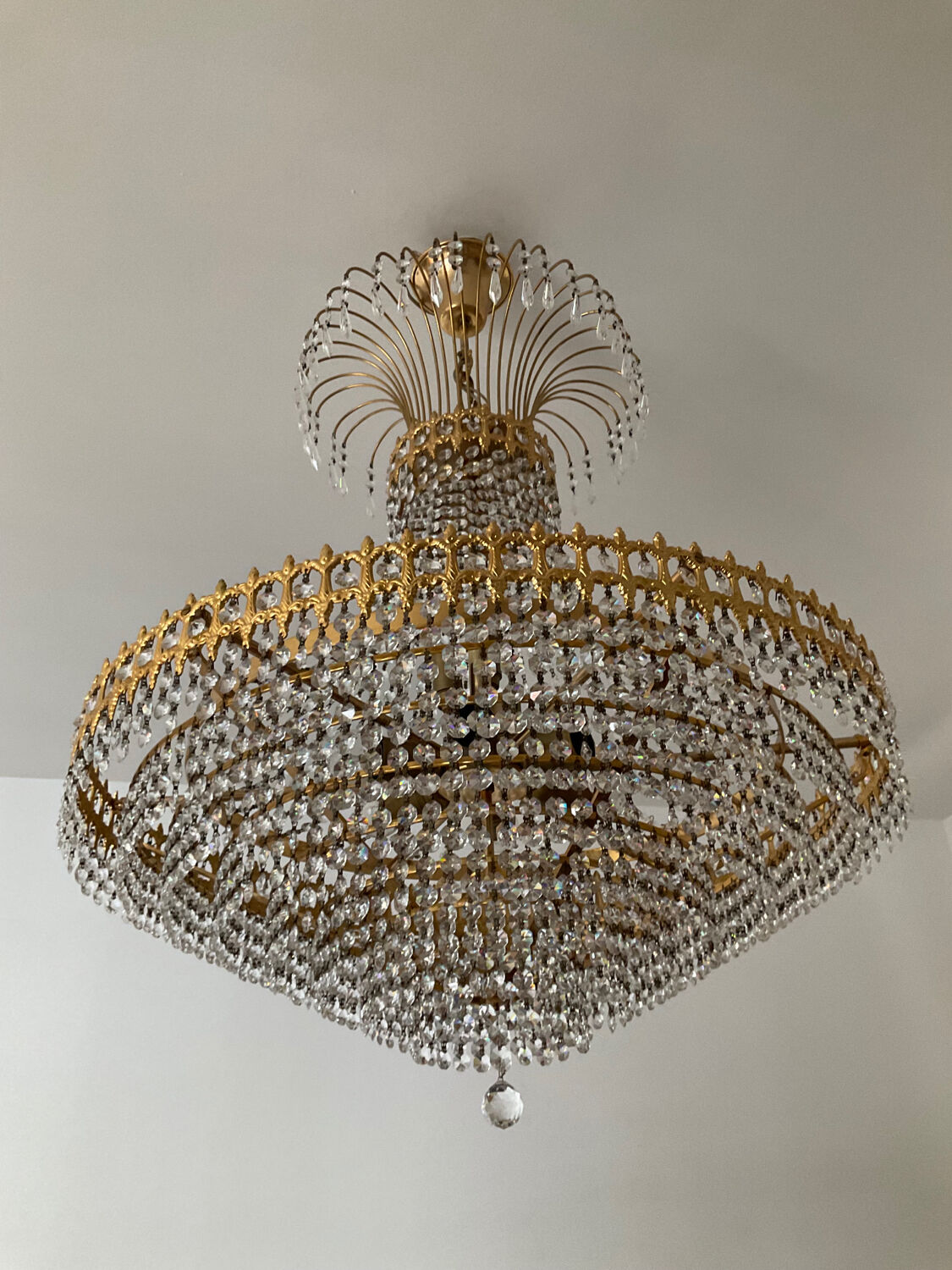 Chandelier cascade of tassels and brass