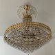 Chandelier cascade of tassels and brass