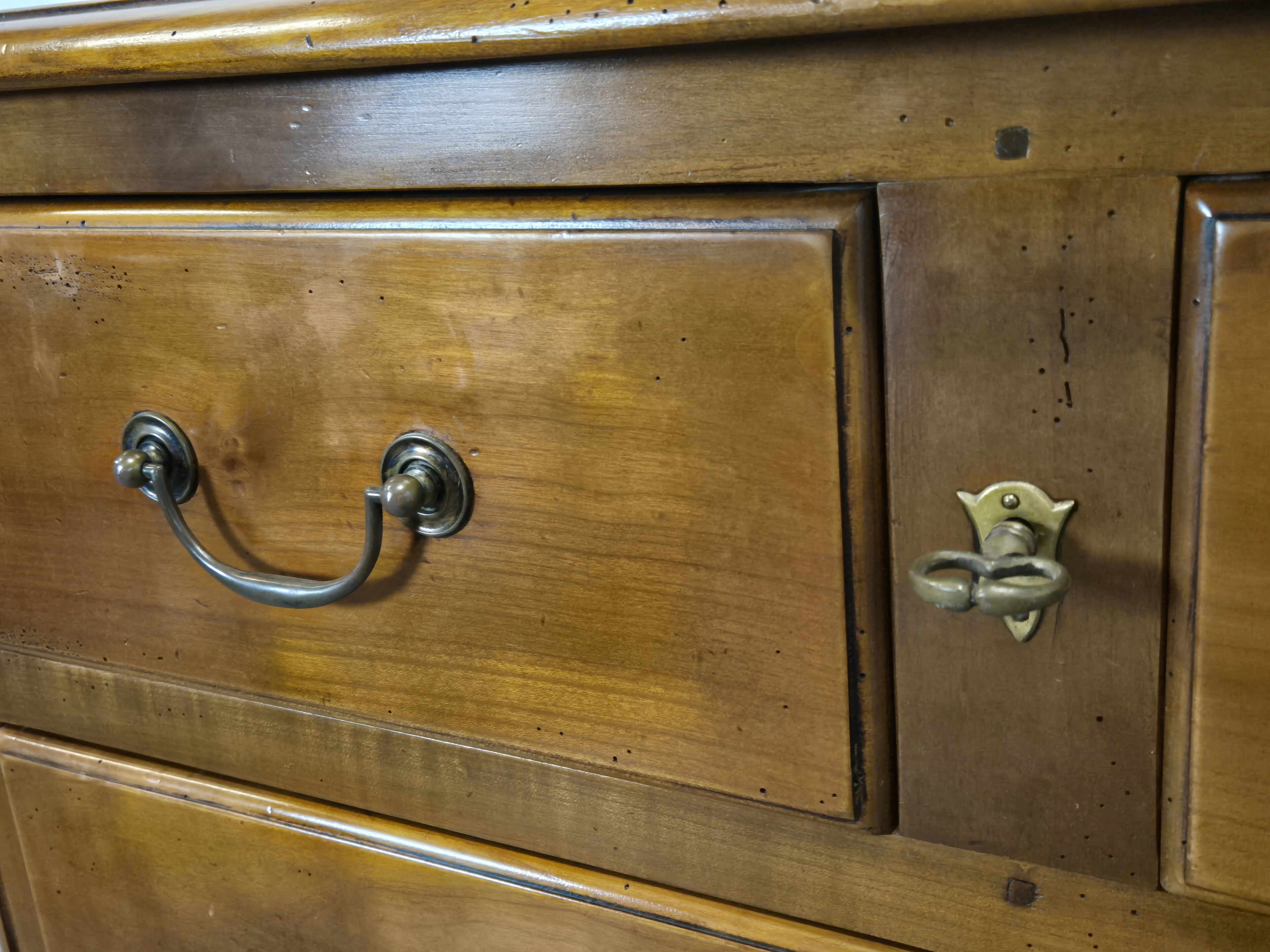 Transitional style chest of drawers in cherry wood