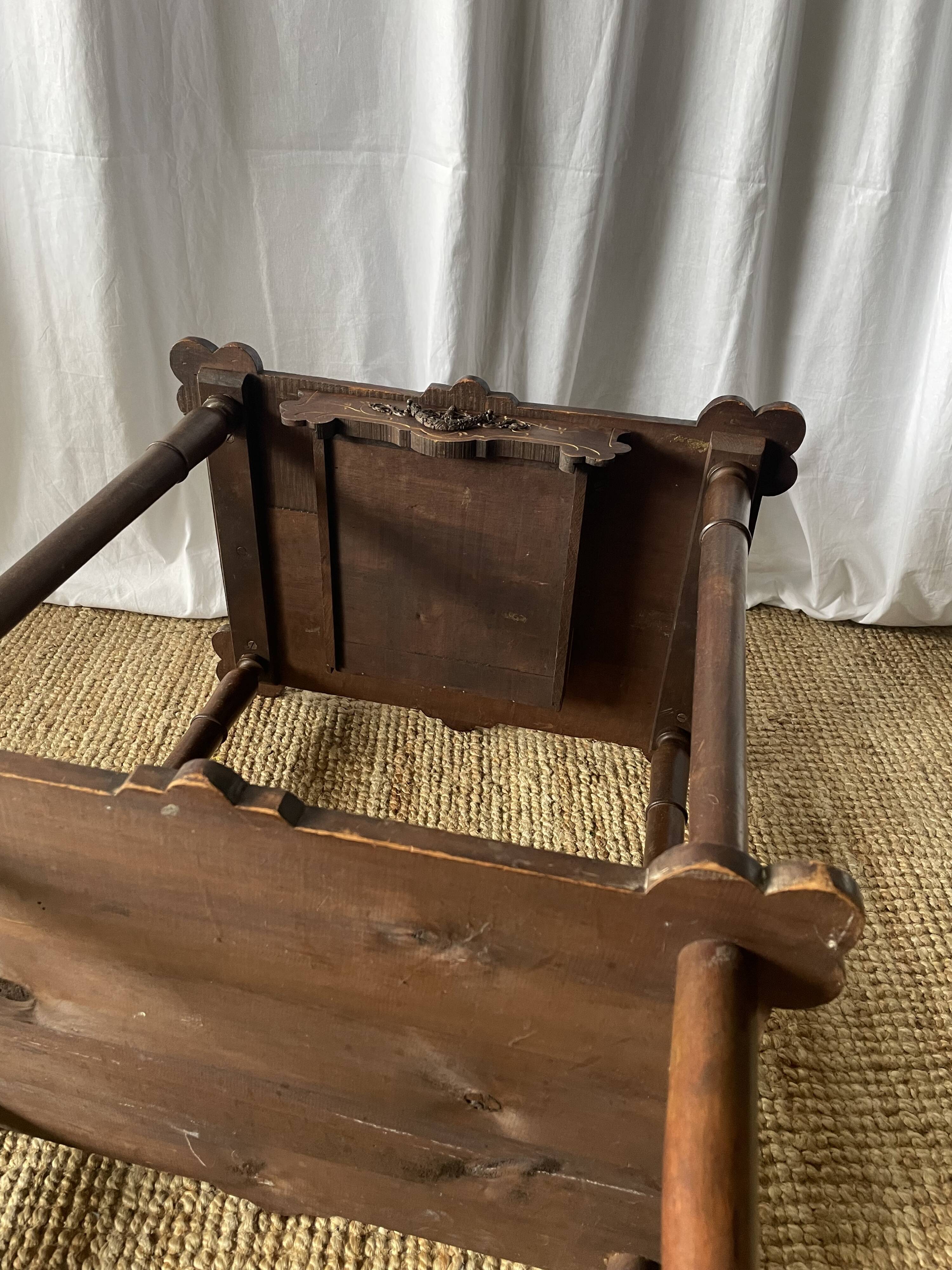 Elegant Art Nouveau side table in walnut, France early 20th century.