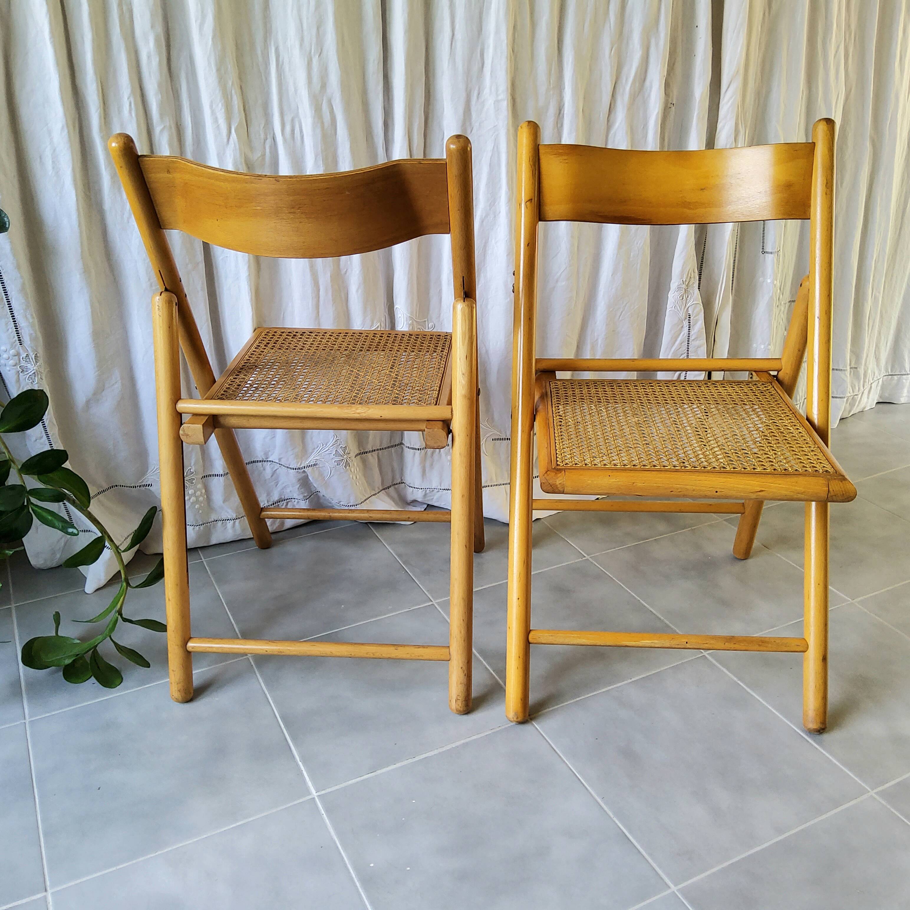 Pair of folding cane chairs
