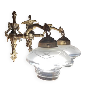 Set of 2 Empire style vintage wall sconces in the shape of a dragon from 1940-1950.