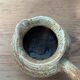 Small beige speckled stoneware pitcher