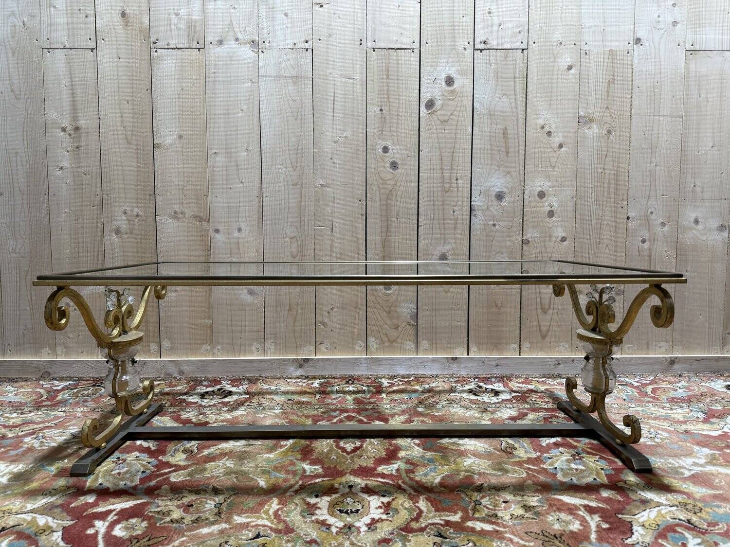 Gold metal and glass coffee table attributed to the BAGUÈS house.