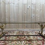 Gold metal and glass coffee table attributed to the BAGUÈS house.