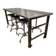 Industrial table with 6 pneumatic stools.