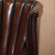 Victorian leather canapé and armchair, barrel back, circa 1860, restored.