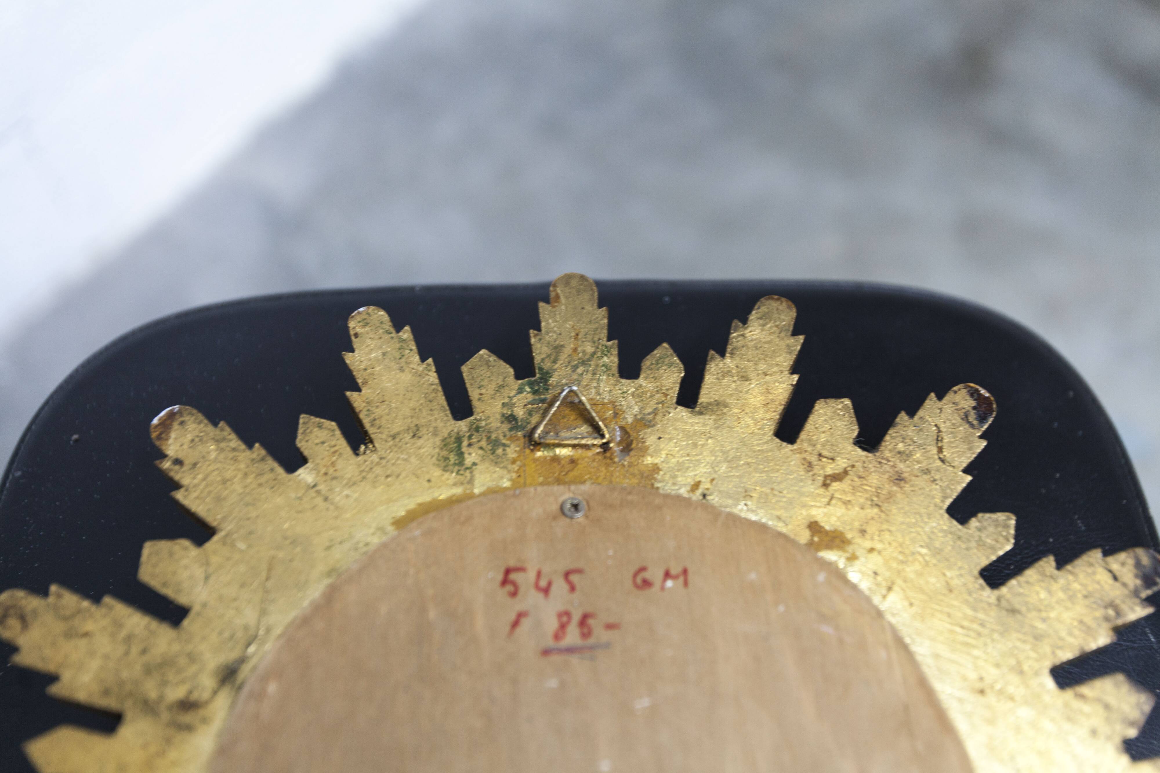 Vintage 1970s convex witch's eye sunburst mirror