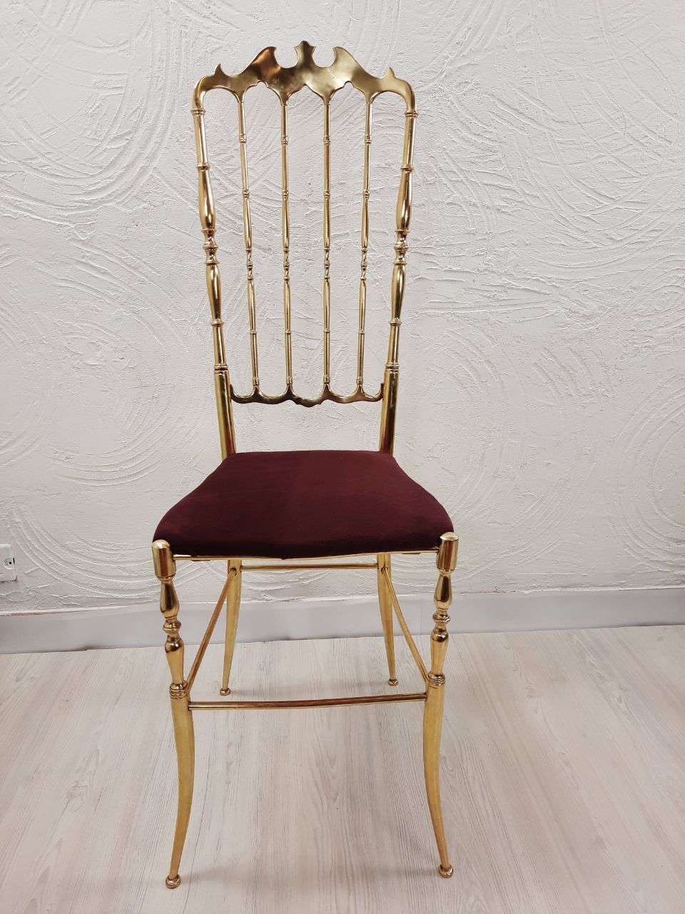 Pair of chiavarine chairs, brass