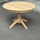 Table de repas ronde extensible en bois massif brut