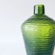 Green carved glass vase