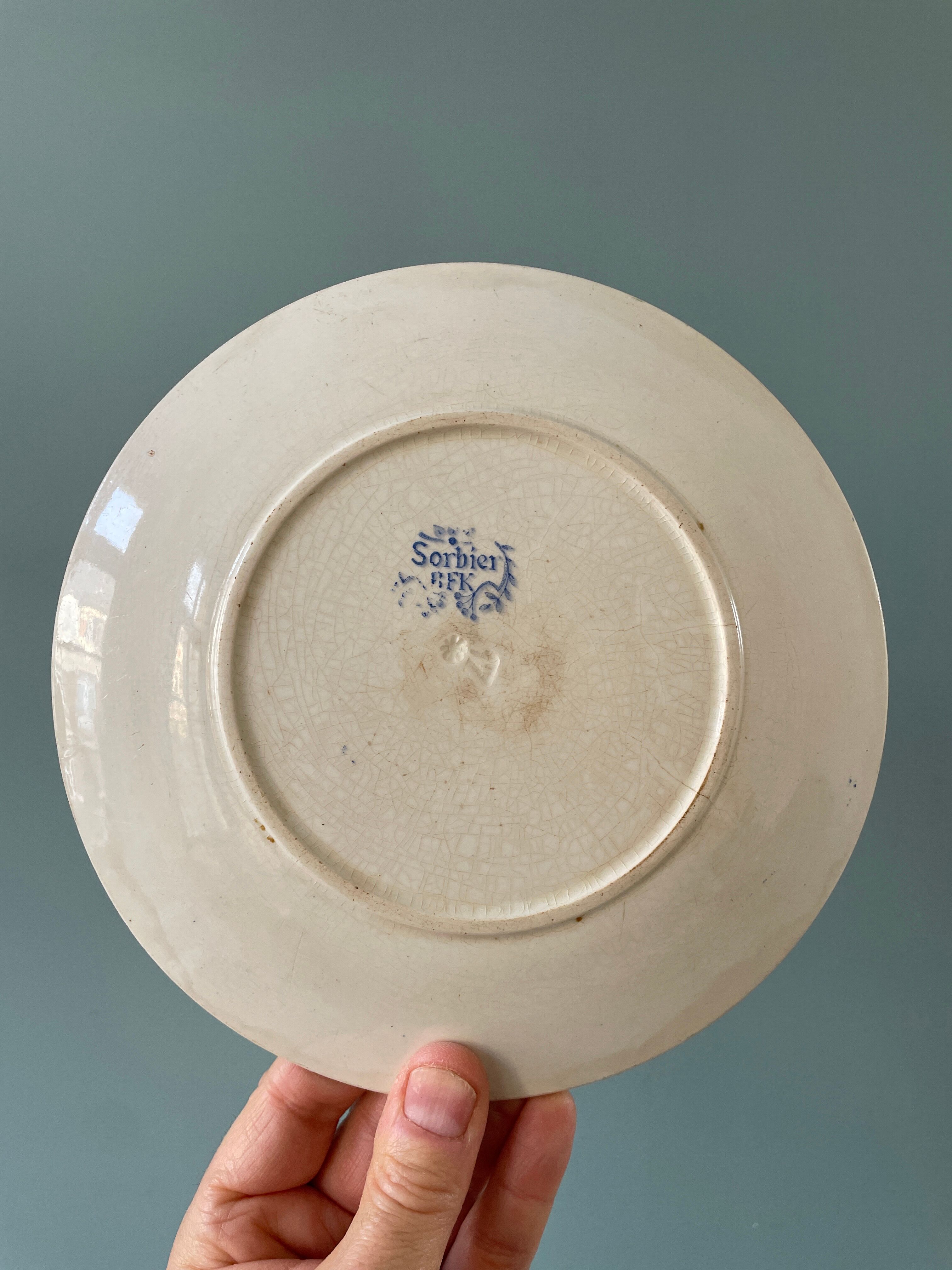 Series of 12 mismatched Terre de Fer dessert plates