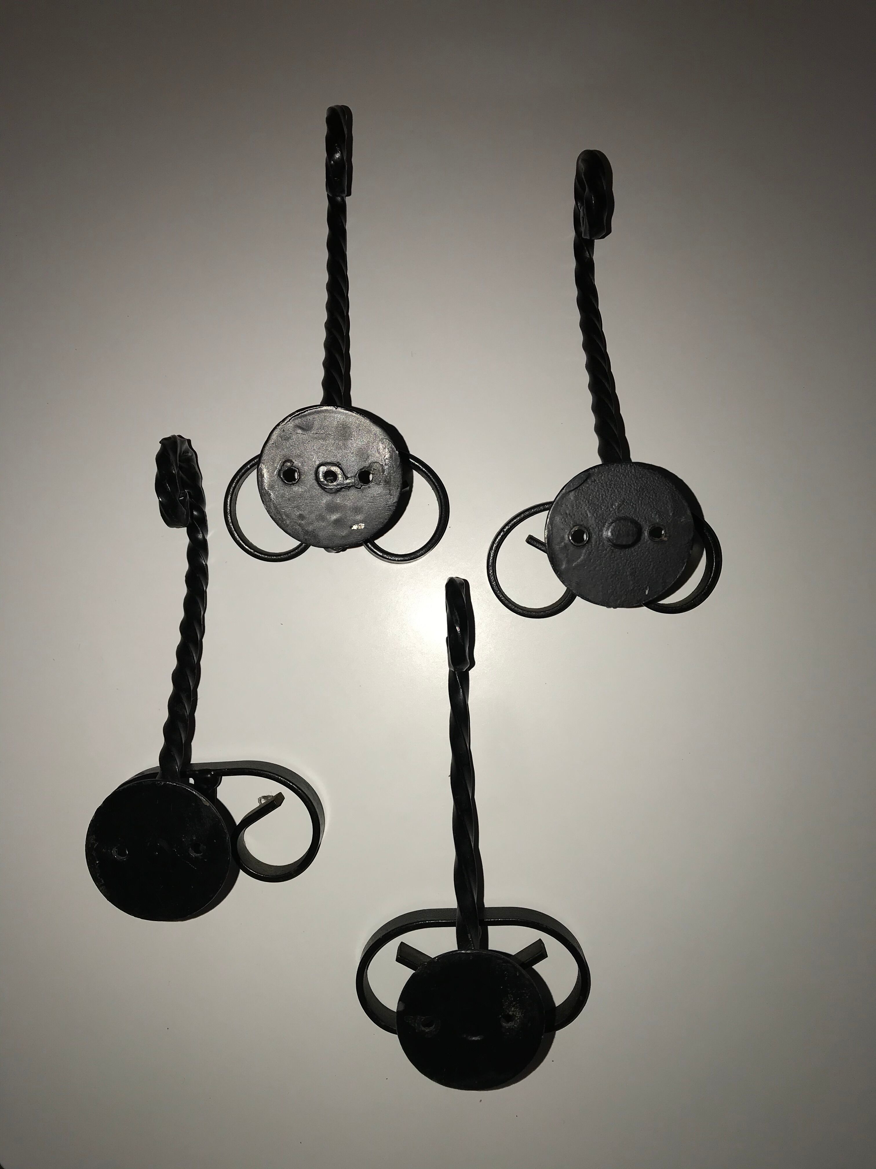 Black wrought iron coat hooks