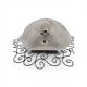 Wrought iron pocket wall sconces featuring a frosted amber glass / metal frame