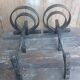Paire de chenets cheminée fer forgé forme circulaire vintage