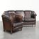 Set of a sheepskin sofa together with its matching club armchair