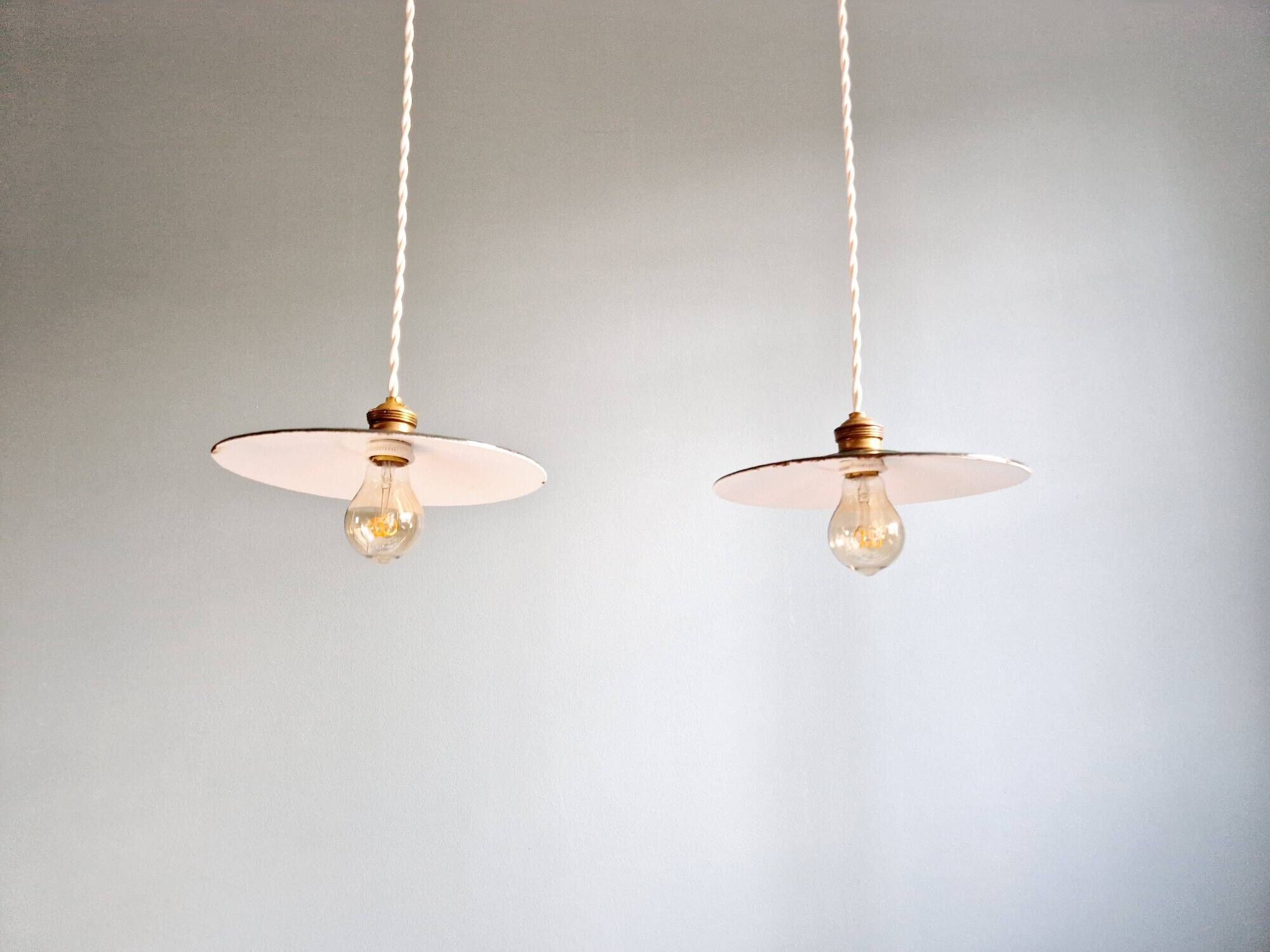 Pair of industrial pendant lights in green enamelled sheet metal