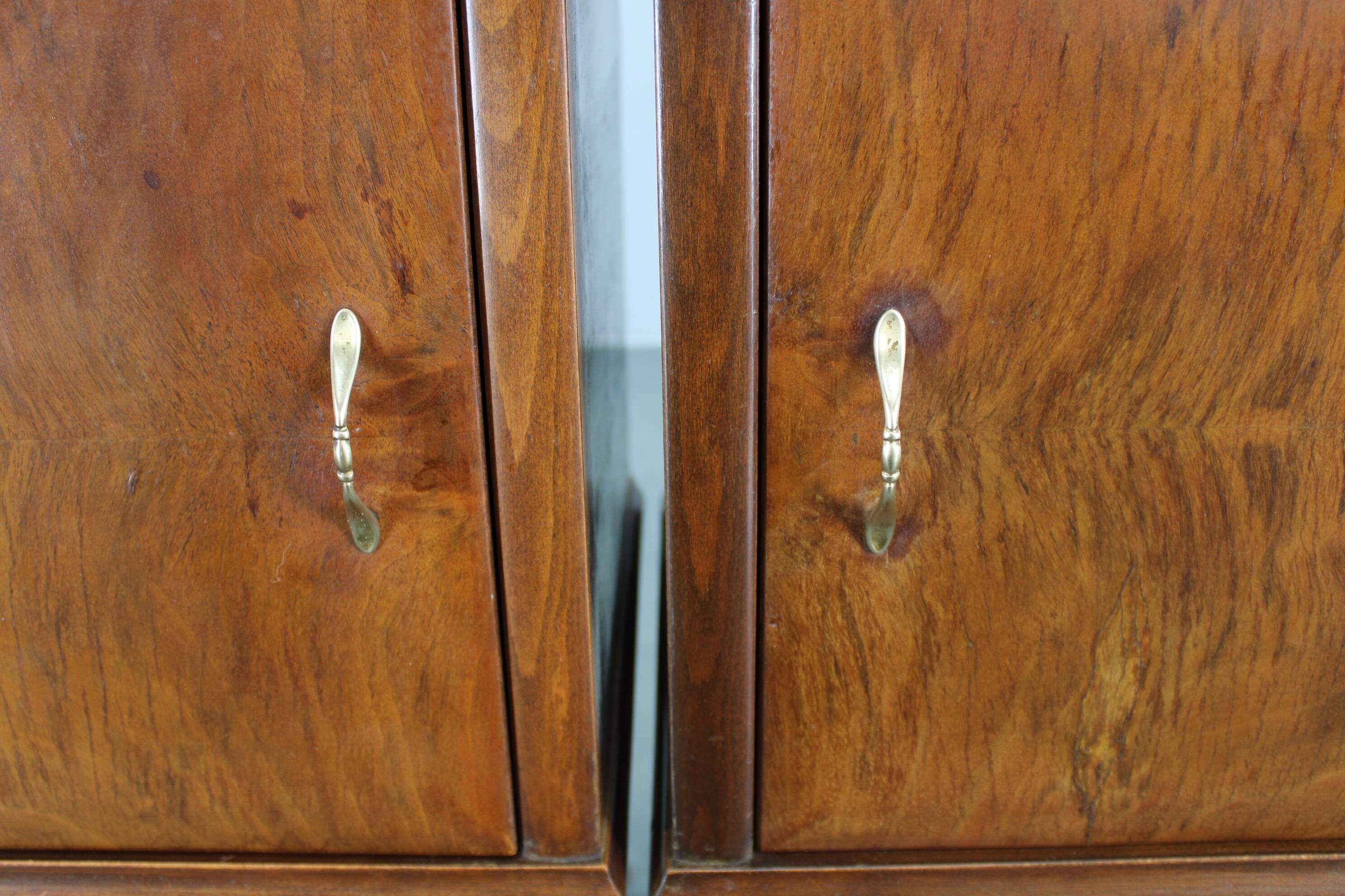 Pair of mid-century Italian walnut nightstands with glass top, 1950s
