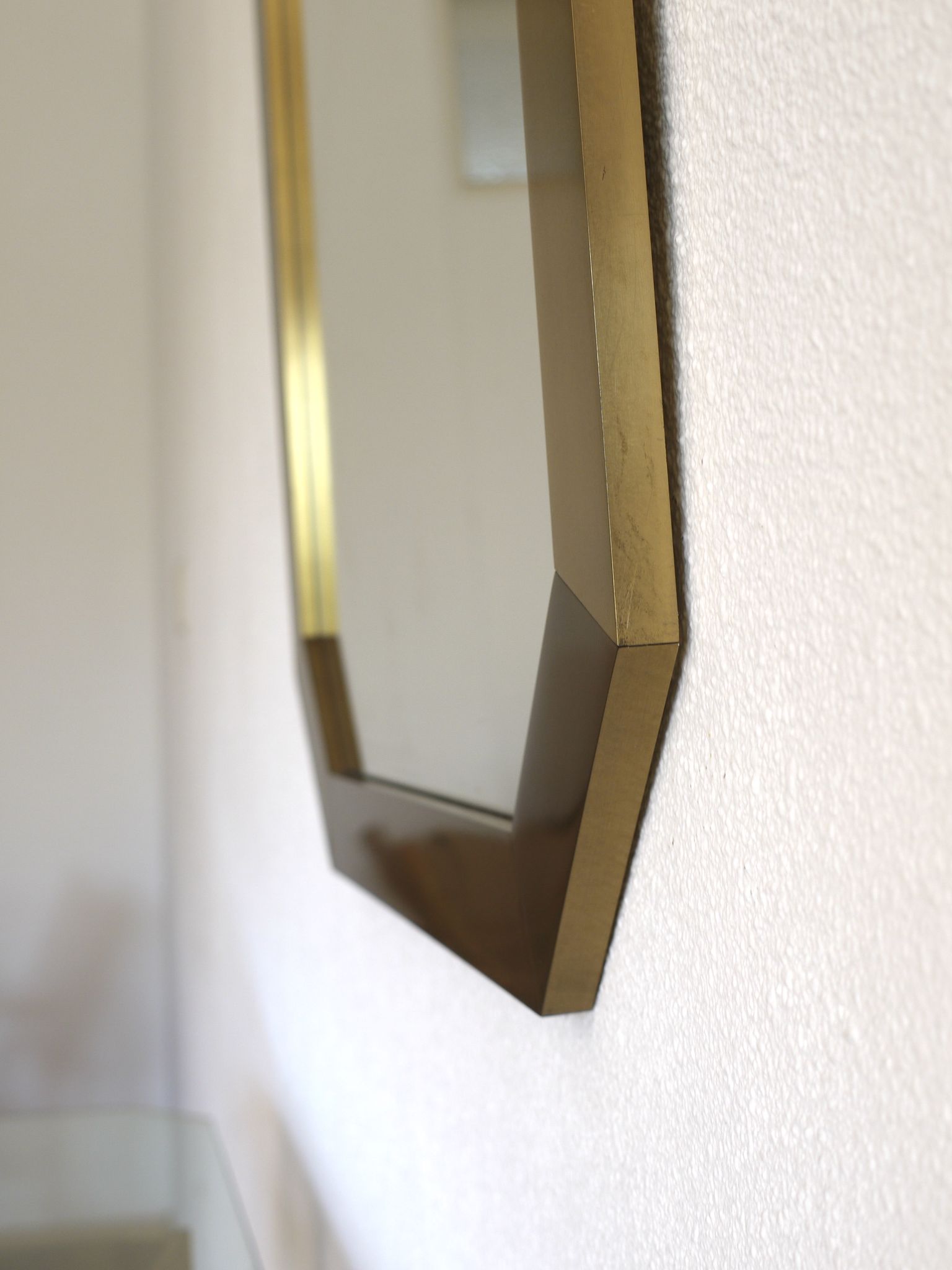 Modernist brass and glass console table & mirror. 1970s