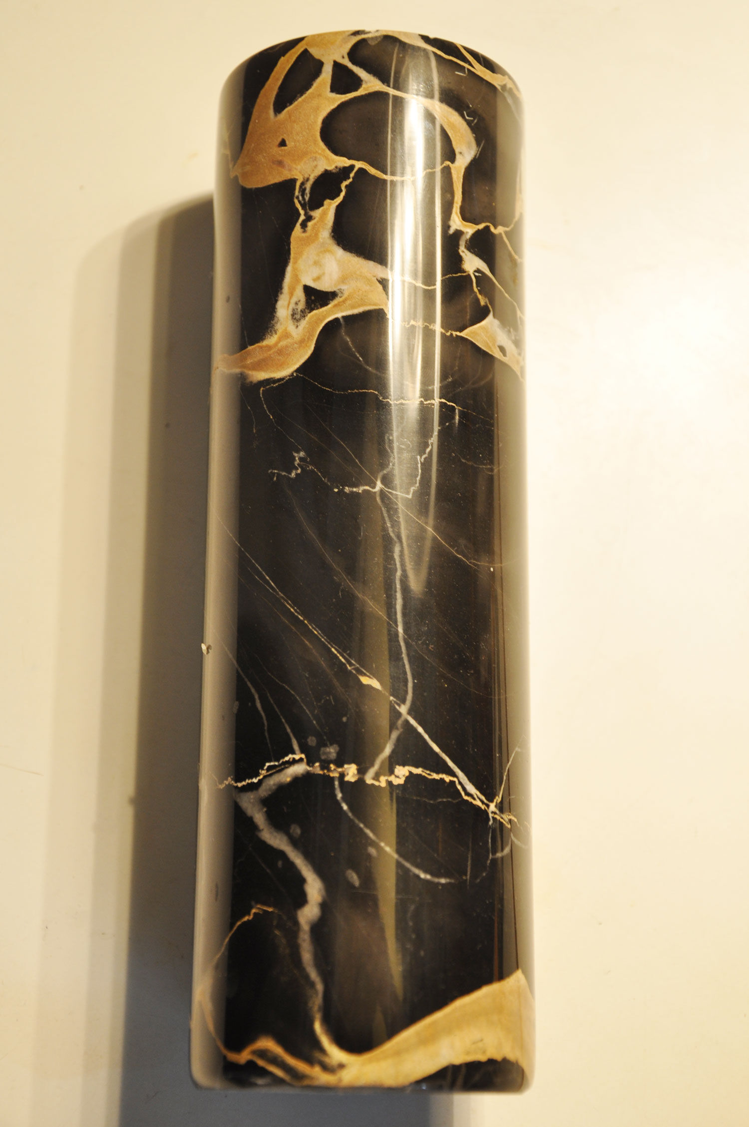 Black marble roller vase