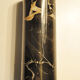 Vase rouleau en marbre noir
