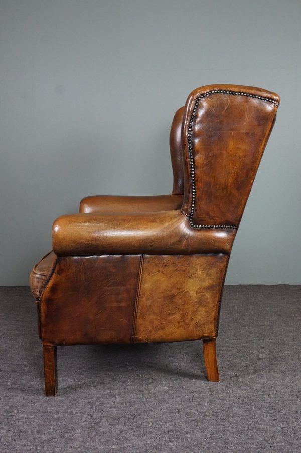 Armchair + sheepskin pouf