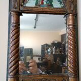 Small antique Empire mirror in gilded wood painted on glass