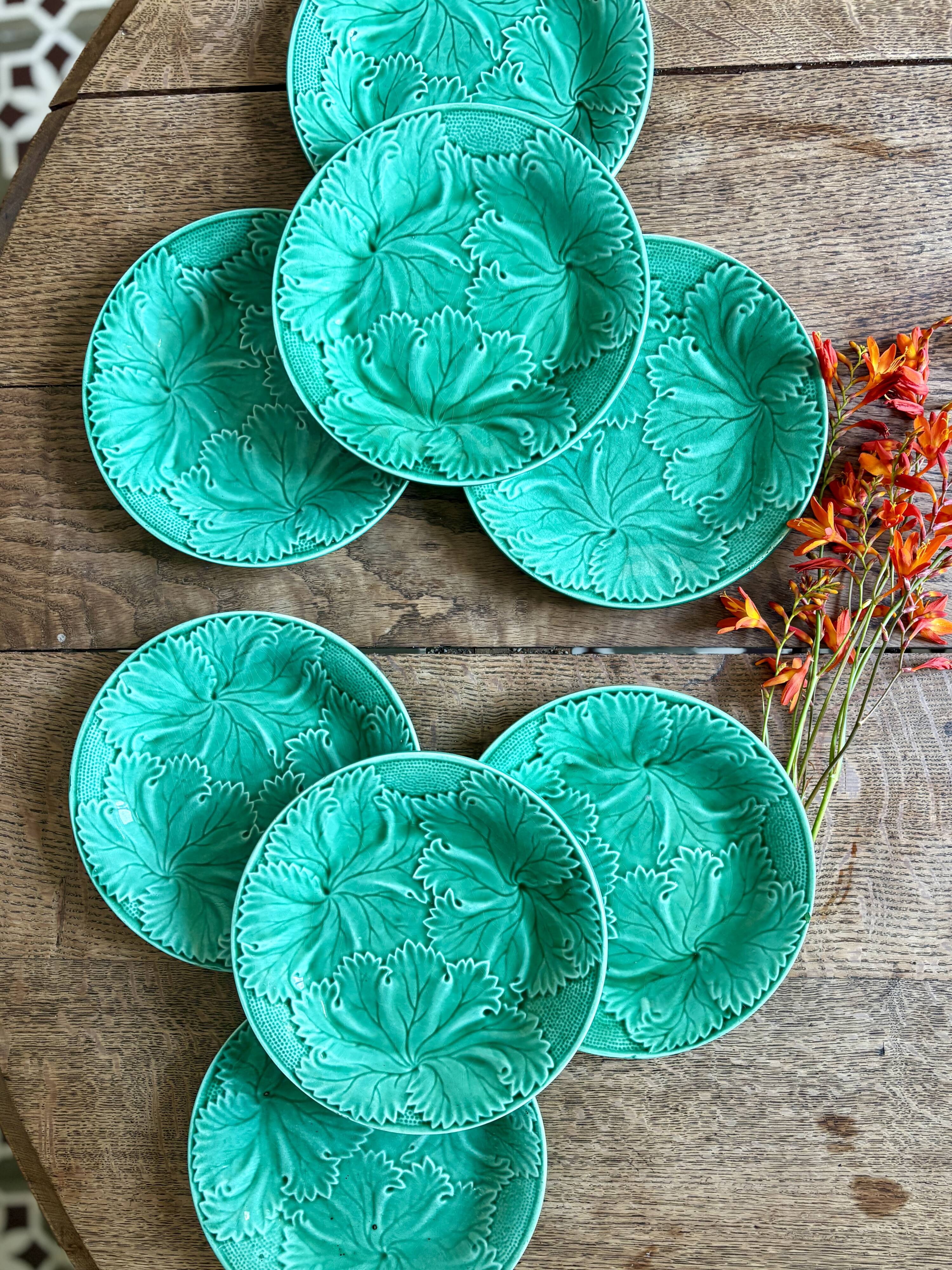 Set of 8 vintage green faience dessert plates, majolica.