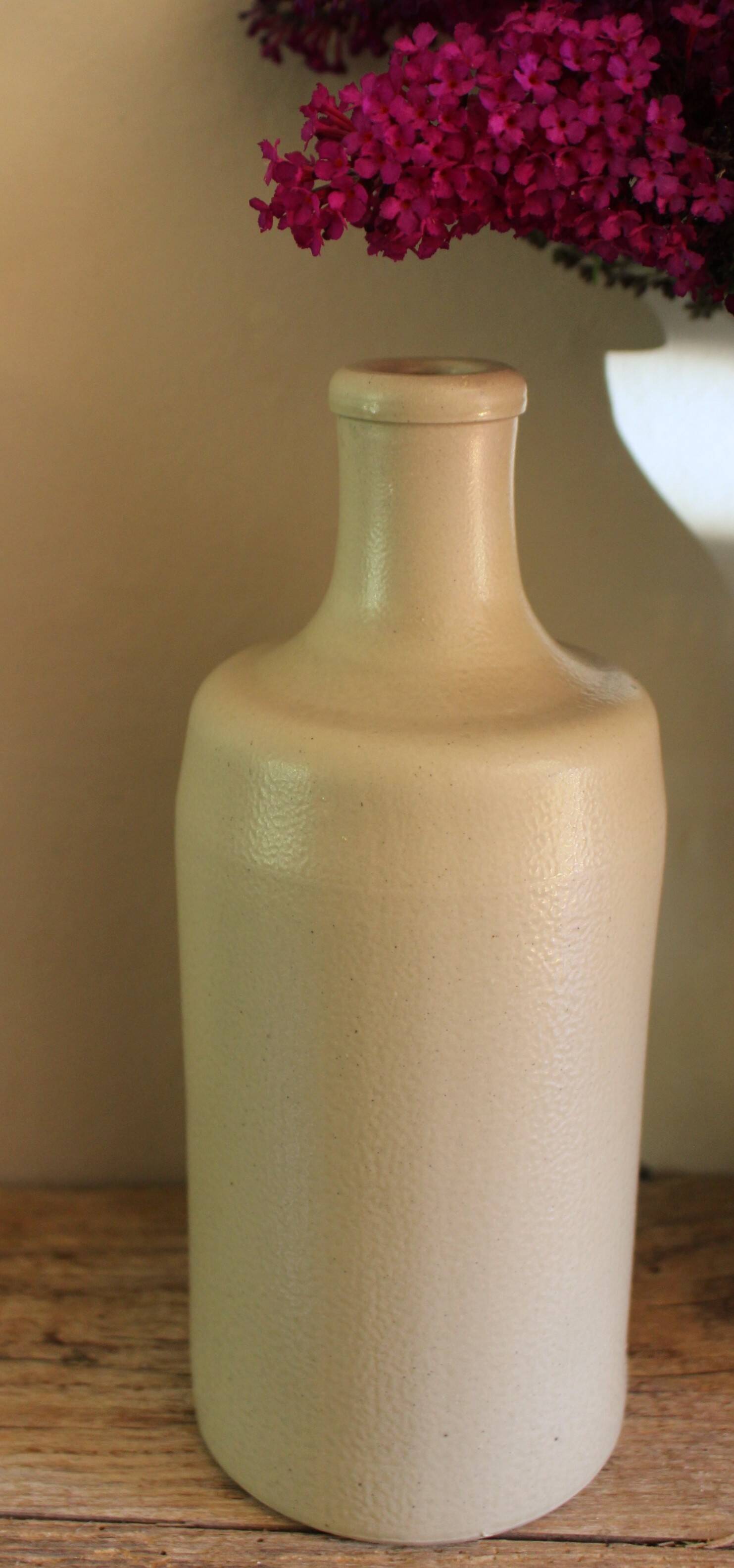 Vintage light stoneware liqueur bottle