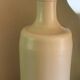 Vintage light stoneware liqueur bottle