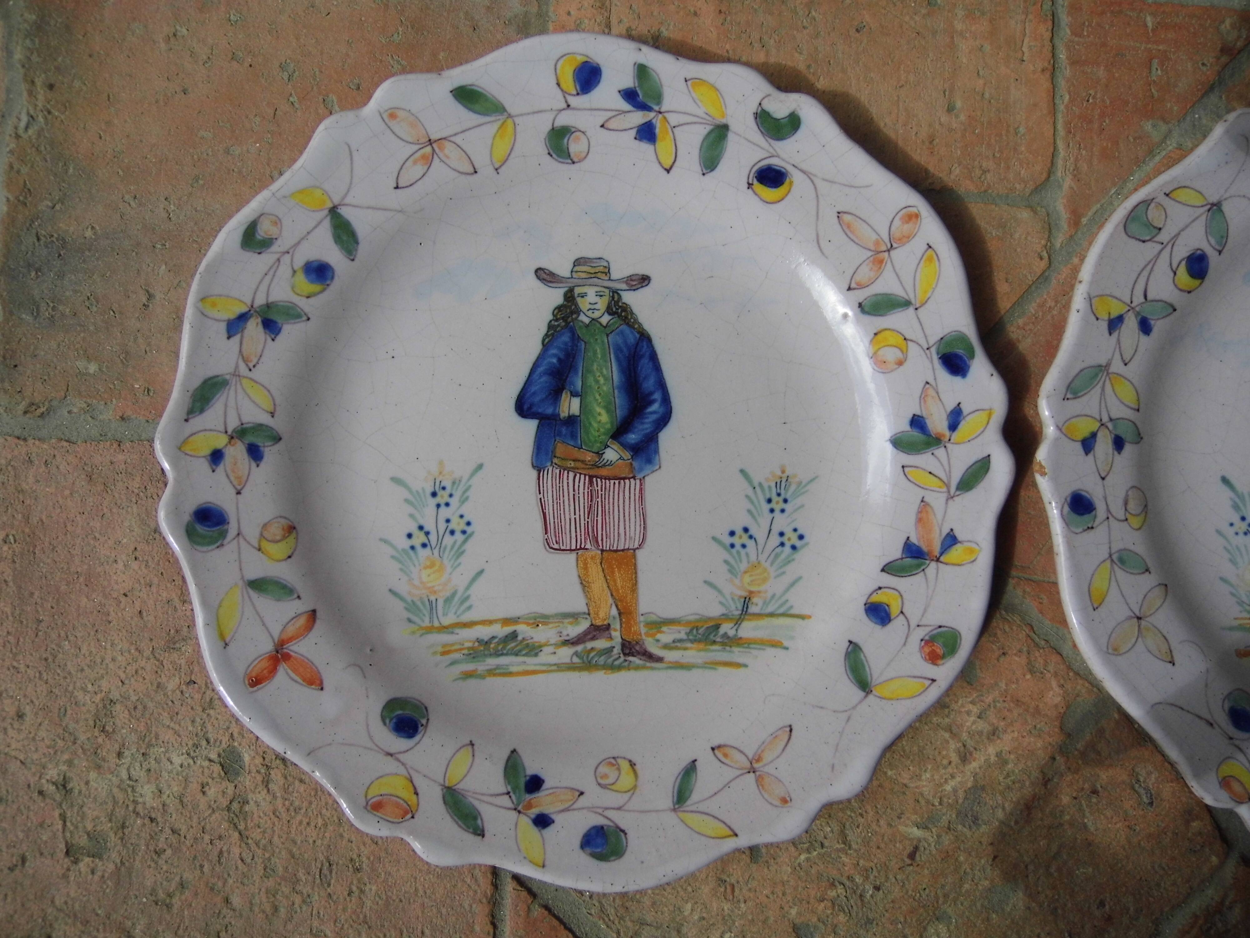 Malicorne earthenware plates, late nineteenth century, Breton décor.