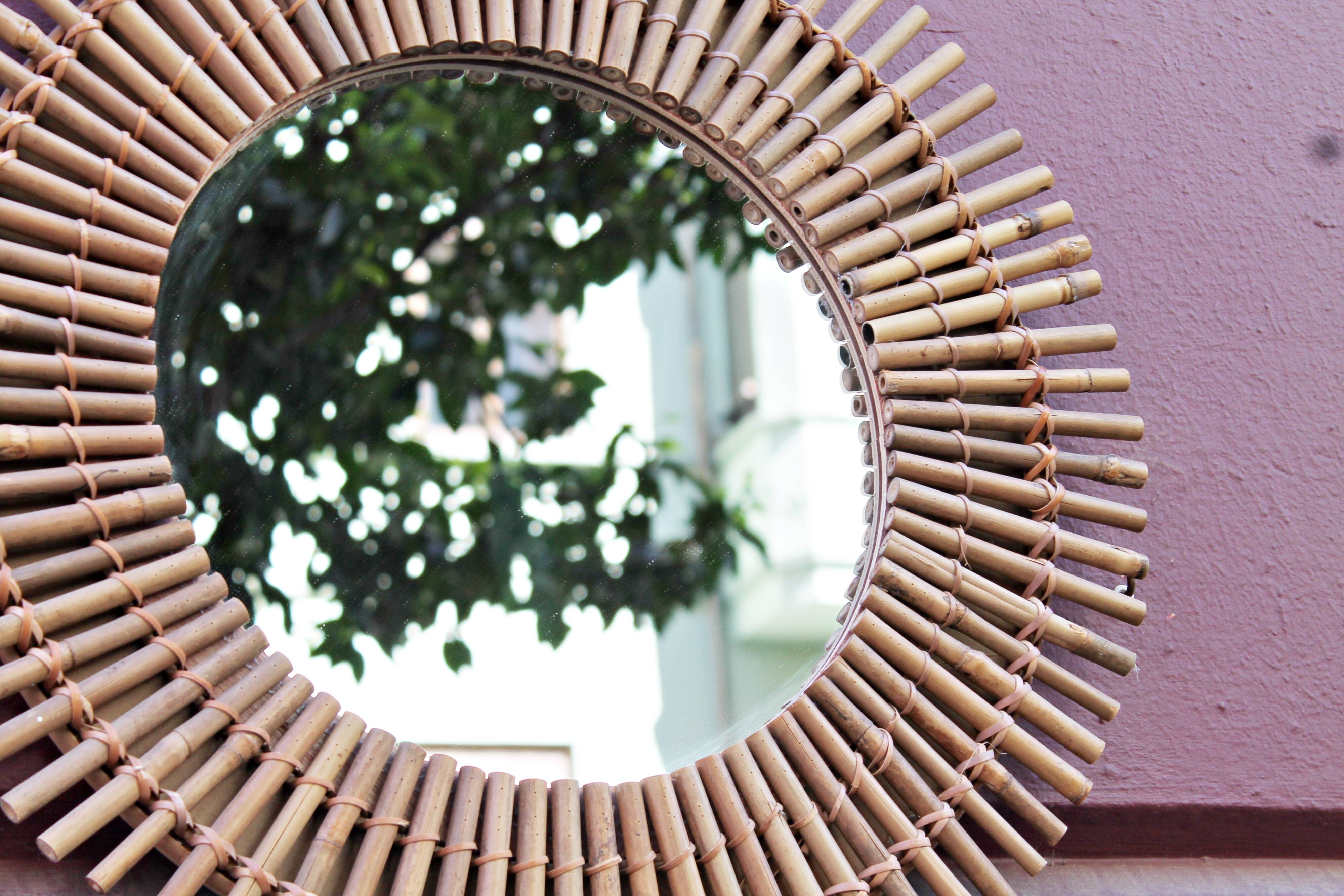 Vintage rattan sun mirror