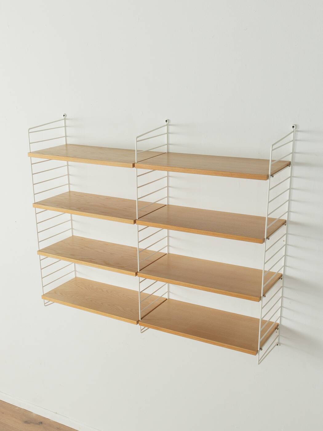 String shelf by Nils Strinning in ash veneer, 1949