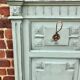 Cloakroom with sage green wall coats