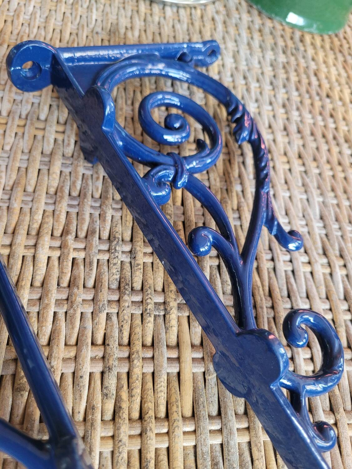 Pair of blue wrought iron shelf brackets